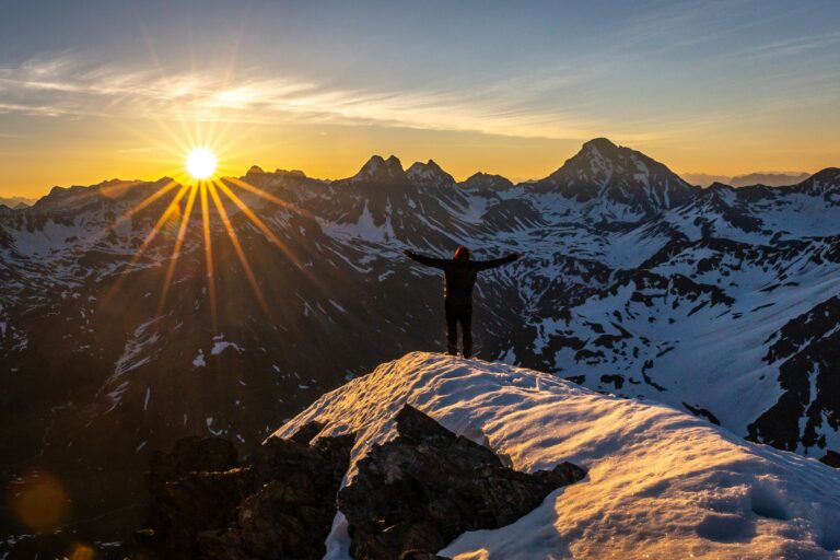 Motivational image of sunrise over mountains inspiring new beginnings
